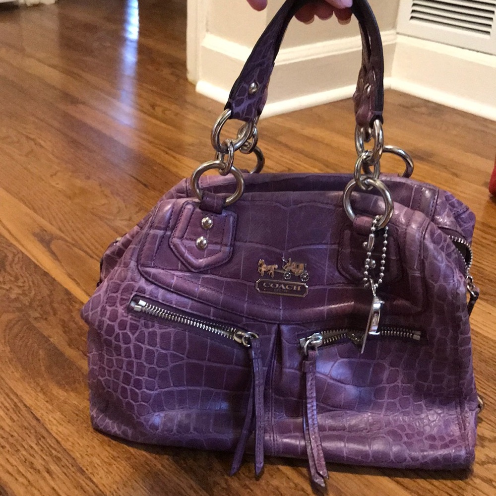Purple reptile skin handbag
